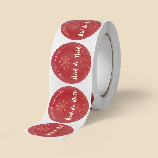 Rouleau d'étiquettes rondes avec un design de Noël