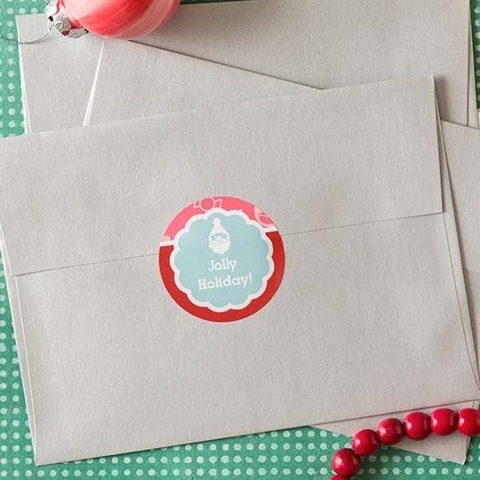 Etiquette ronde avec un design de Noël pour sceller une enveloppe