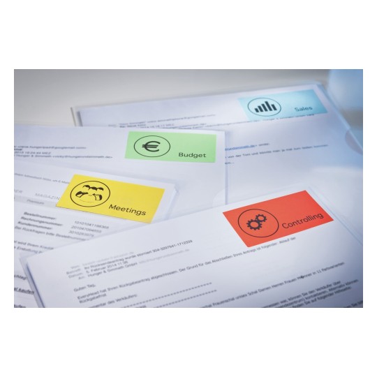 L'image montre des documents avec des étiquettes colorées pour différentes catégories : réunions, budget, ventes et contrôle, suggérant une organisation ou planification d'affaires.