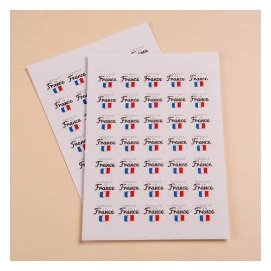 Ces feuilles montrent des timbres représentant la France, avec le mot 'France' en écriture stylisée, entouré de drapeaux français.